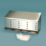 Stainless steel dispenser for sterile gloves